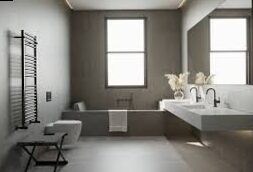 Waxed concrete bathroom on tiles